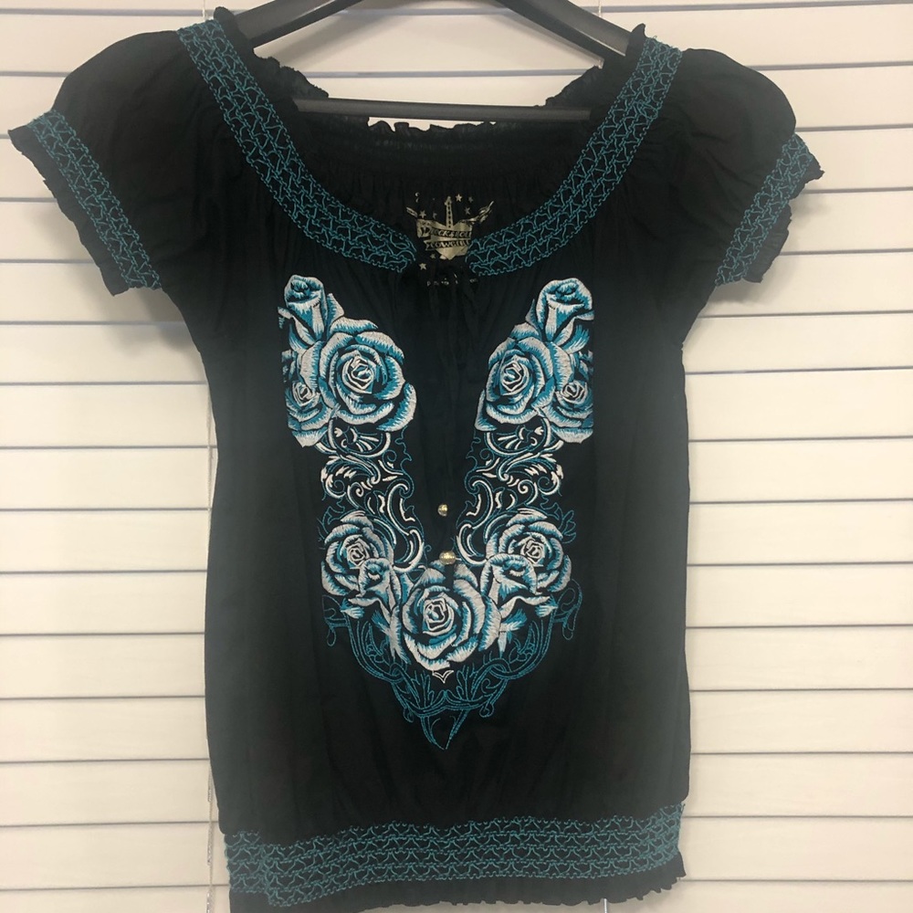 Embroidered turquoise and white rose blouse.